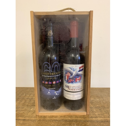 22 - A boxed 60th Anniversary of the Normandy landings bottles of commemorative French Bordeaux red wine ... 