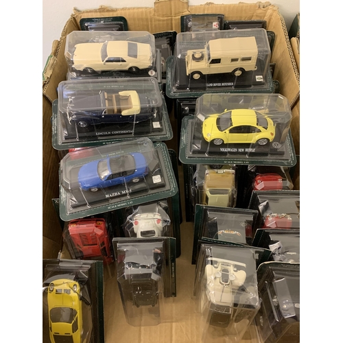 235 - Two large boxes of packaged die cast vehicles