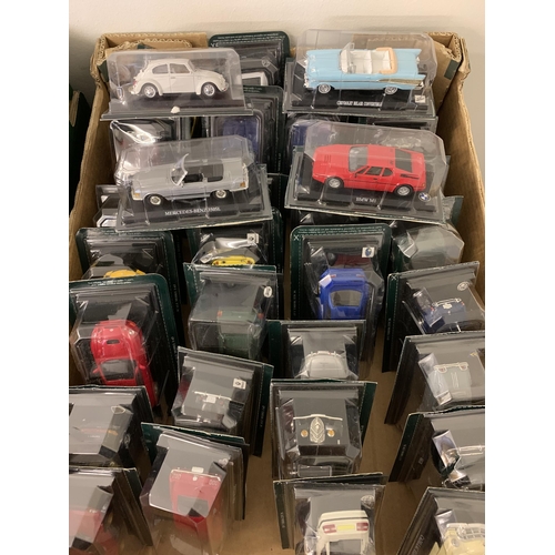 235 - Two large boxes of packaged die cast vehicles