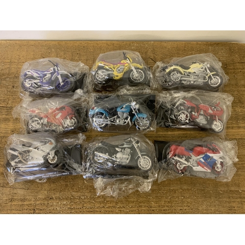 236 - An over full box of Maisto collectors motorcycles