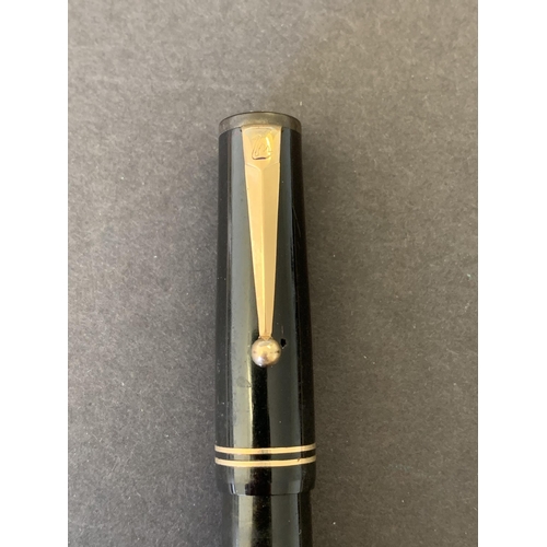 248 - A vintage Mabie Todd & Co Ltd Swan 'Visofil' ink pen with 14ct gold nib (signs of age and use)