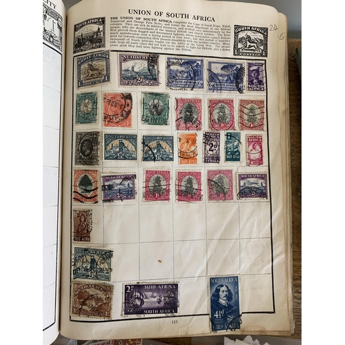 292 - Two early to mid 20th Century UK and world stamp albums plus loose and a brass Singer badge