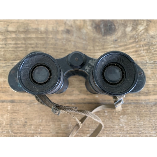 310 - A set of WW2 Taylor Hobson binoculars, dated 1941 (lots of wear with age)