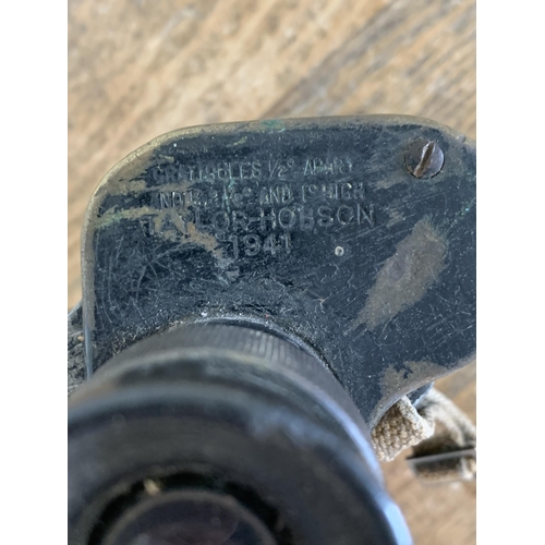 310 - A set of WW2 Taylor Hobson binoculars, dated 1941 (lots of wear with age)