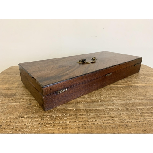 316 - A vintage pistol style box, 17