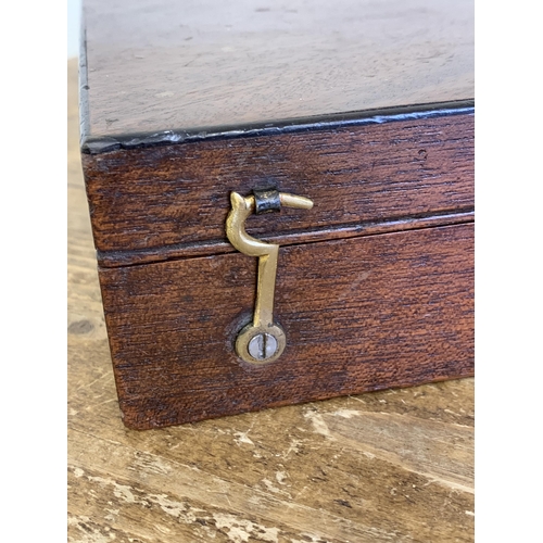 316 - A vintage pistol style box, 17