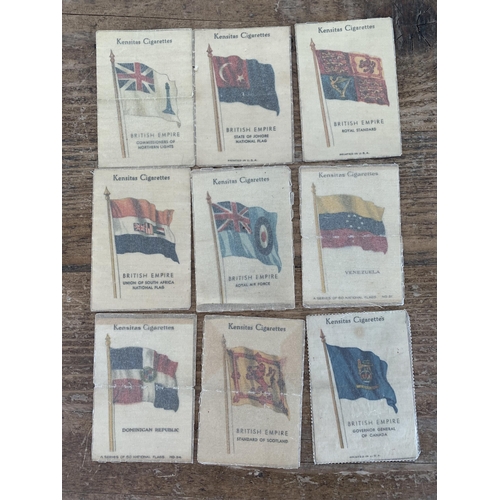 321 - A small collection of FDC's and cigarette cards, including silks