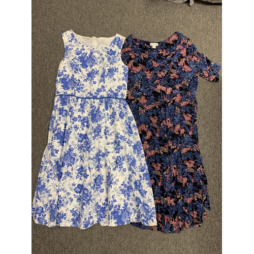 330 - A selection of Monsoon dresses, two skirts and a cardigan, sizes approx. 14/16