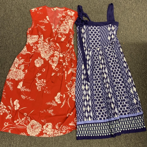 330 - A selection of Monsoon dresses, two skirts and a cardigan, sizes approx. 14/16