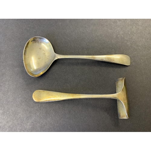 339 - A hallmarked silver cased childs feeding spoon and pusher