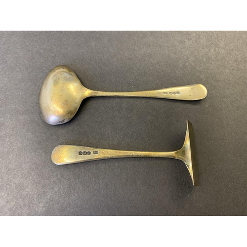 339 - A hallmarked silver cased childs feeding spoon and pusher