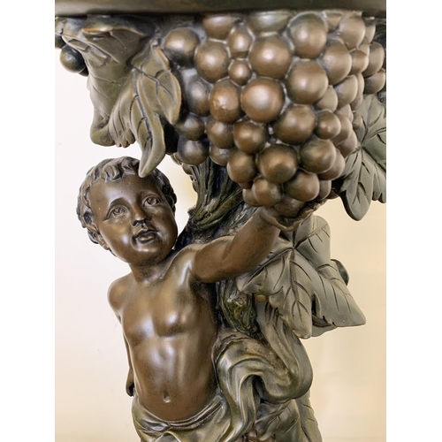 385 - A faux bronze resin cherub jardiniere stand, approx. 33