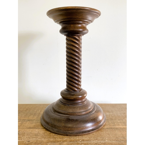 386 - A vintage turned oak barley twist plant pot stand, approx. 17 1/2