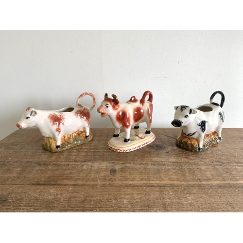 396 - Eighteen vintage ceramic cow creamers