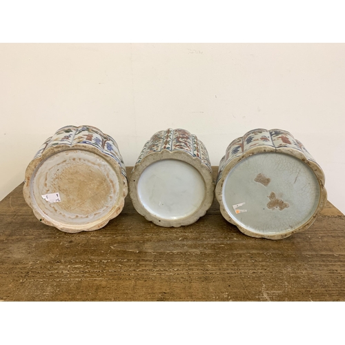 67 - Three vintage Oriental hand painted lidded jars, 5 1/2