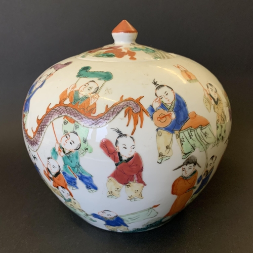 69 - A vintage hand painted Oriental pumpkin shaped lidded jar with dragon and figures and character mark... 