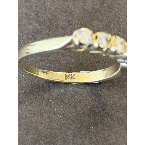 150 - A 14ct gold and six diamond set ring, approx. size N 1/2, weight approx. 2.7g