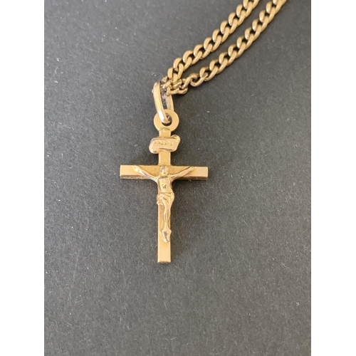 117 - A yellow metal cross on chain, various parts are indistinctly marked, the jump ring is 14ct, weight ... 