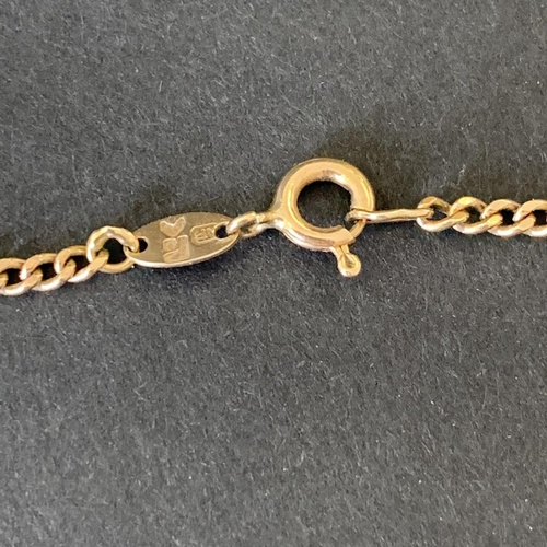 117 - A yellow metal cross on chain, various parts are indistinctly marked, the jump ring is 14ct, weight ... 