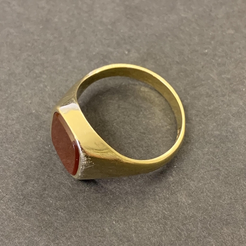 122 - A 9ct gold and carnelian stone set ring, approx. size V 1/2, weight approx. 7g