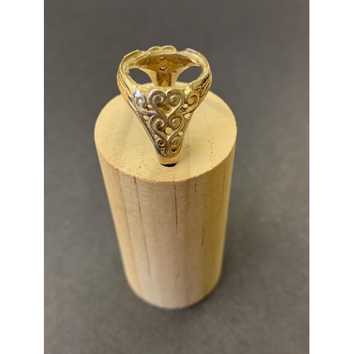 124 - A 9ct gold ring, approx. size T, weight approx. 4.5g (lacking central stone)