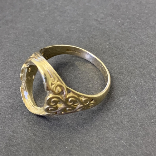 124 - A 9ct gold ring, approx. size T, weight approx. 4.5g (lacking central stone)