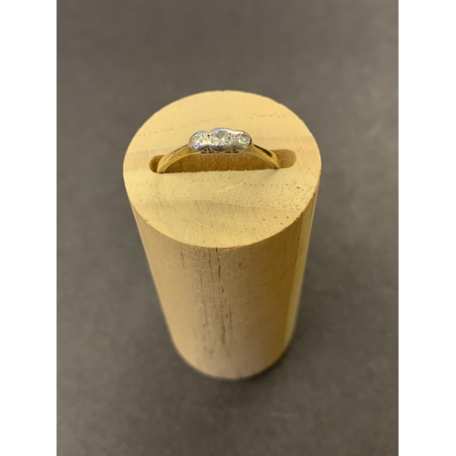 126 - An 18ct gold and three diamond set ring, the shank is out of shape so approx. size K, weight approx.... 