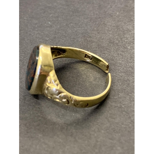 127 - A 9ct gold and carved seal top ring, the shank has been cut so approx. size T, weight approx. 4.7g