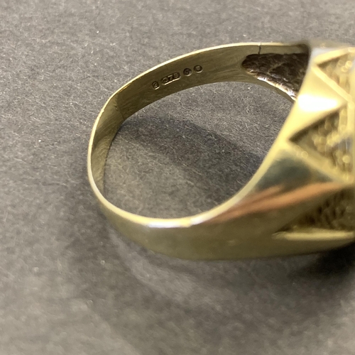 130 - A 9ct gold ring with bird emblem to top, possibly a seal, approx. size T, weight approx. 7g (the sha... 