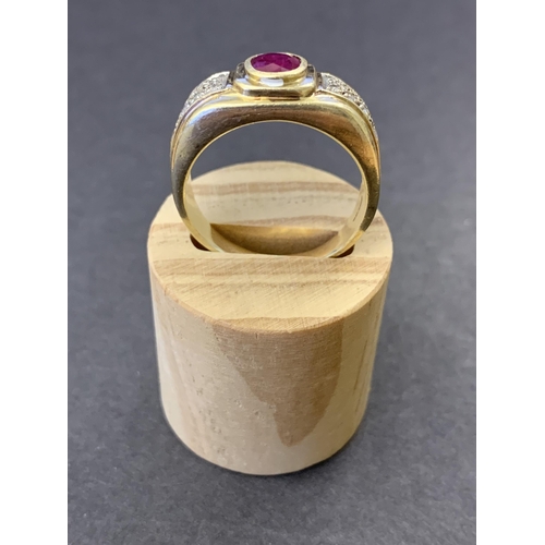 131 - A 9ct gold ring with large red stone and diamond chip shoulders, approx. size V, weight approx. 8.2g