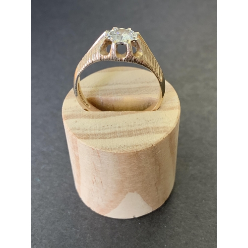 137 - A 9ct gold ring with large central diamond, approx. size U, weight approx. 4.5g