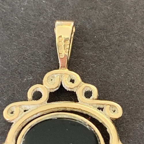 141 - Two 9ct gold and stone set swivel fobs, the largest 30mm long