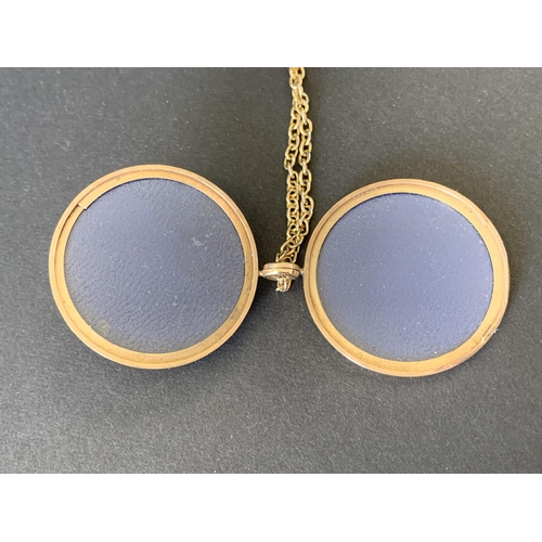 143 - A 9ct gold locket on yellow metal chain, locket weight approx. 11.2g, total weight approx. 17g