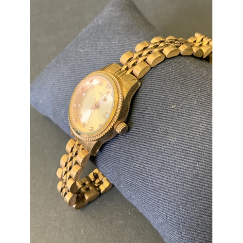 154 - A vintage ladies Sekonda quartz wristwatch on original strap, 25mm dia, ticks and runs