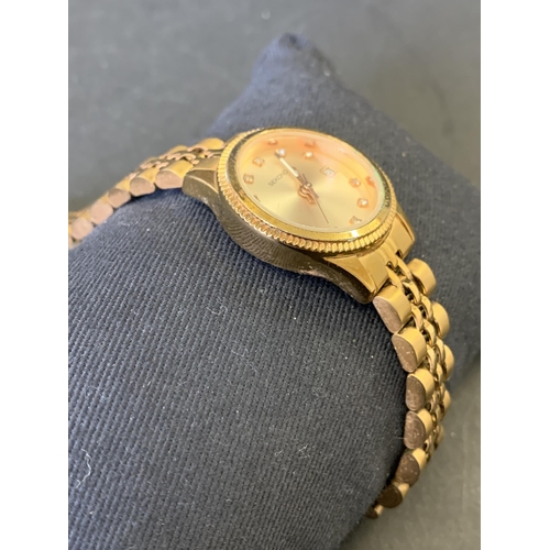 154 - A vintage ladies Sekonda quartz wristwatch on original strap, 25mm dia, ticks and runs