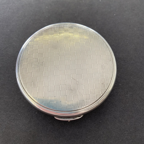 159 - A hallmarked silver compact with internal mirror, Birmingham 1932, maker Mappin & Webb, just over 2