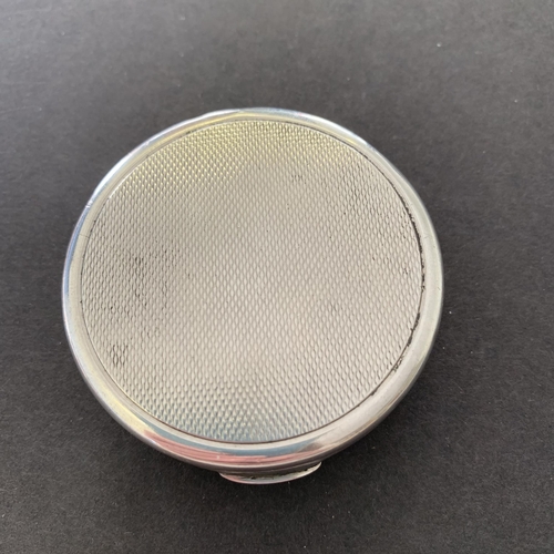 159 - A hallmarked silver compact with internal mirror, Birmingham 1932, maker Mappin & Webb, just over 2