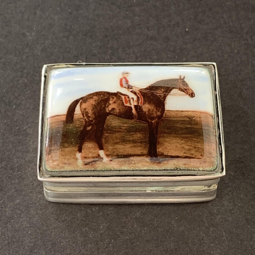 160 - A 925 sterling silver snuff box with enamelled lid depicting a horse and jockey, just under 1 1/2