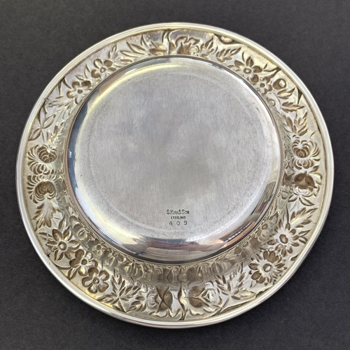 168 - A vintage American sterling silver dish, maker S Kirk & Son, decorative repousse border decorated wi... 