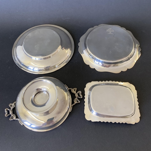 169 - Four items of silver plate including a dish with decorative handles, 5 1/2