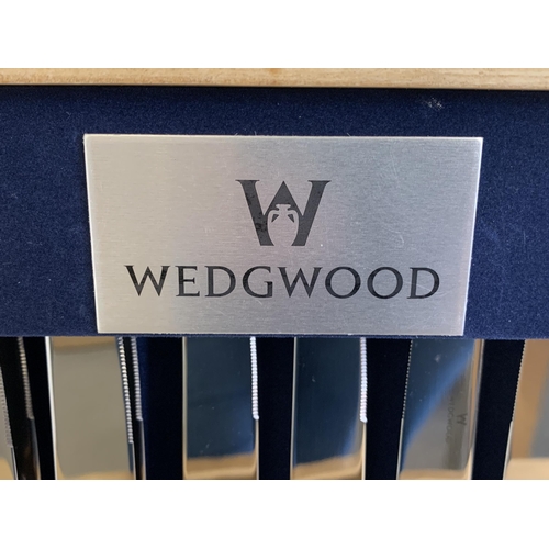 171 - A wooden boxed canteen of cutlery by Wedgwood, 58 pieces in an 8 setting