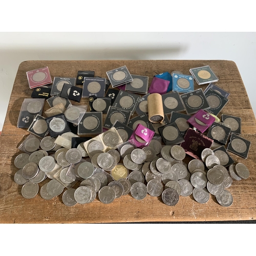 176 - Approx. 160 commemorative crowns, some cased including a roll of 1972 Elizabeth and Phillip