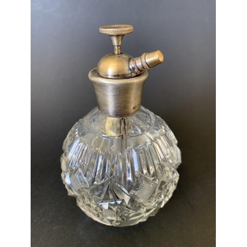 195 - A sterling silver and cut glass atomiser perfume bottle