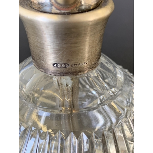 195 - A sterling silver and cut glass atomiser perfume bottle