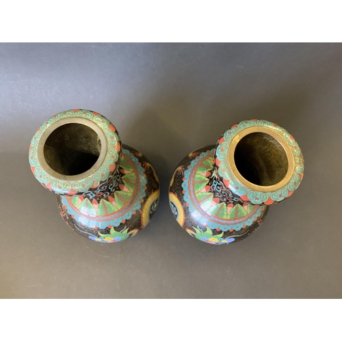 20 - A pair of vintage Oriental cloisonne vases decorated with dragons, approx. 9