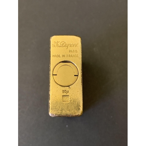 200 - A vintage boxed S J Dupont gold plated lighter with original sales information for 1980, bought in F... 