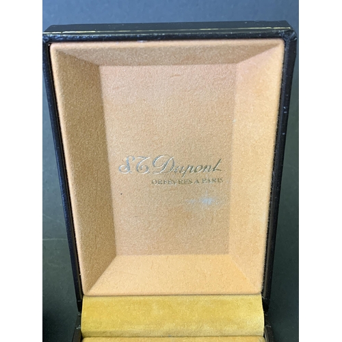 200 - A vintage boxed S J Dupont gold plated lighter with original sales information for 1980, bought in F... 