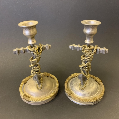 203 - A pair of vintage white metal and gilded section Navy themed anchor candlesticks, just over 7