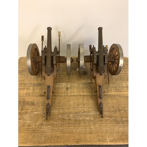 206 - A pair of vintage wood and bronze barrel model cannons with metal fittings, approx. 16