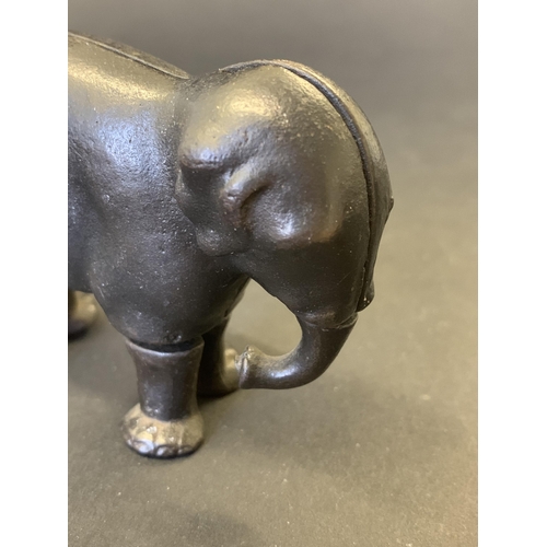 219 - A late 19th Century cast iron walking elephant toy, marked 'Patent 1873', most likely made by the Iv... 